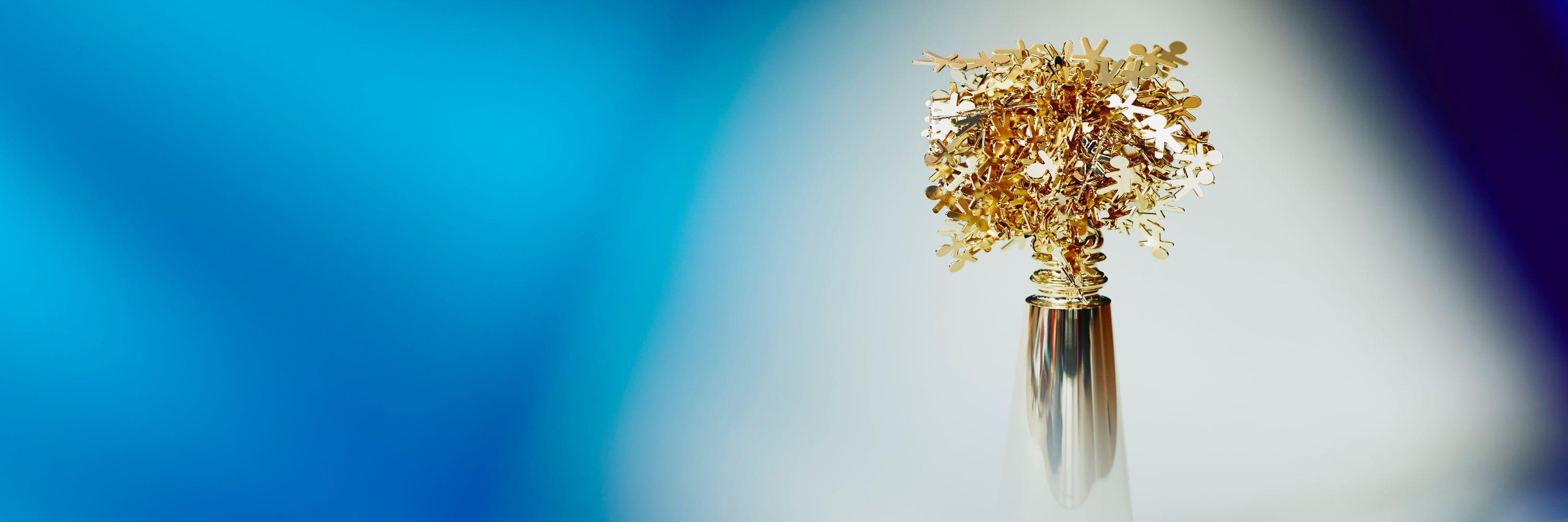 an image of gold flower decorations in a vase