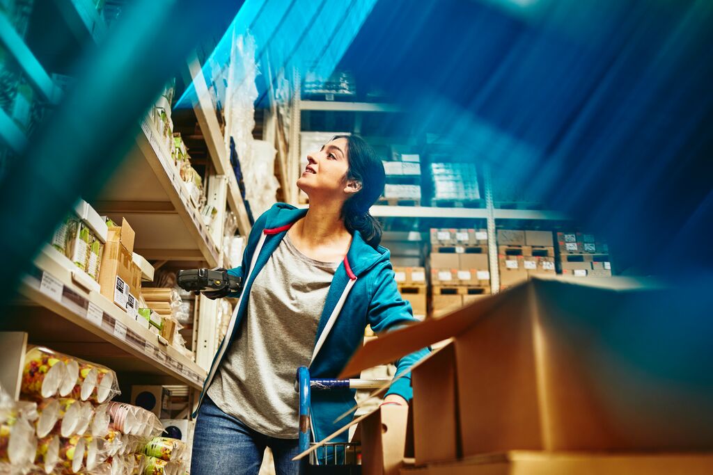 A photo of a woman working as a truck driver