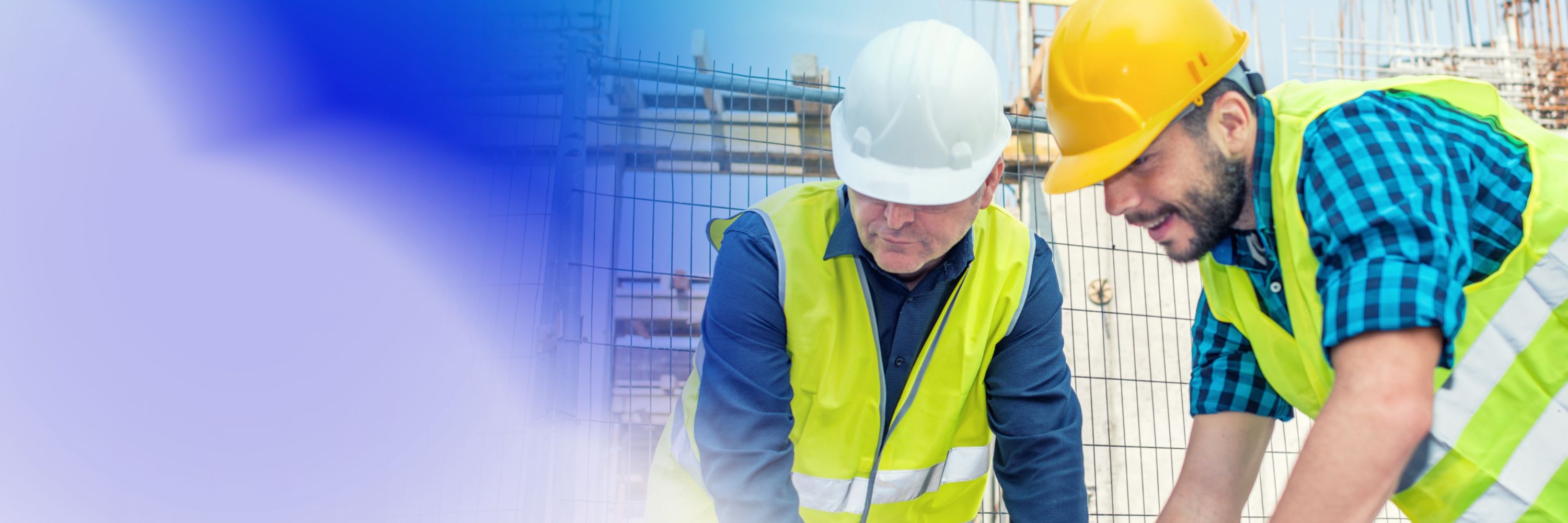 two men working together on a construction site