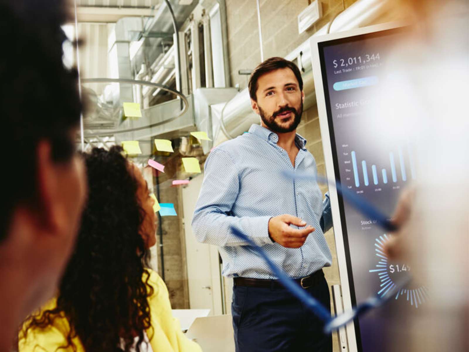 man presenting in a meeting