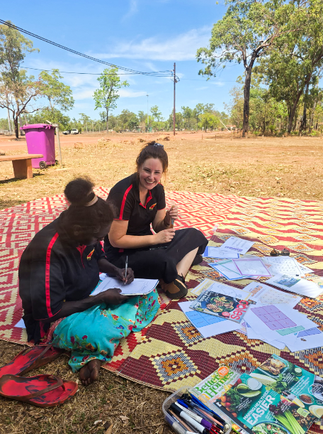 an image of a woman smiling at another woman