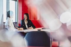 Man and woman talking in an office
