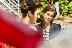 Man and woman looking at some documents