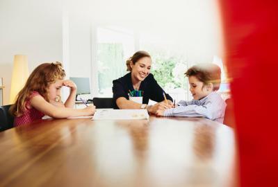 A woman bonding with her kids