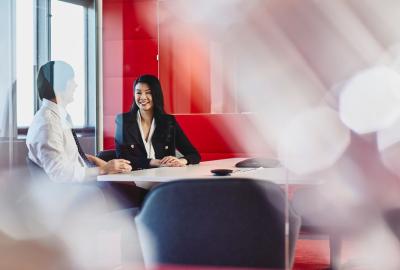 Man and woman talking in an office