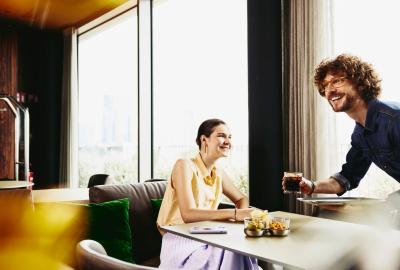  A man and woman having coffee