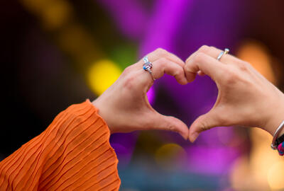 image of two hands shaped into a heart