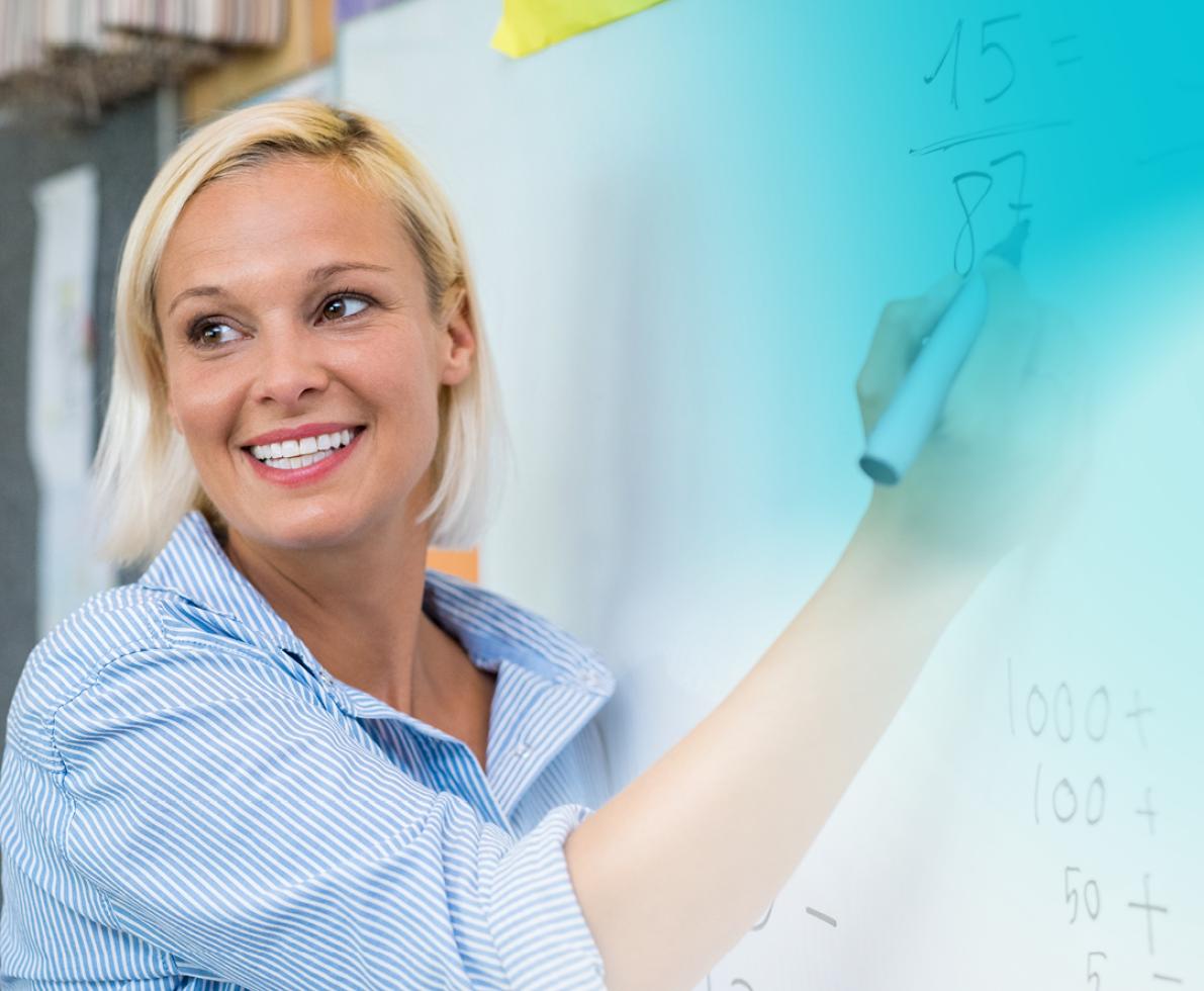 A photo of a teacher teaching a STEM class