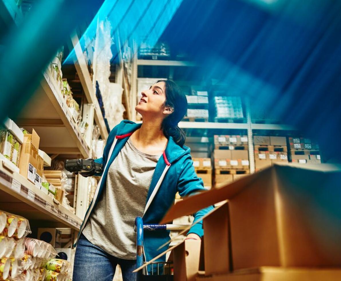 A photo of a woman working as a truck driver