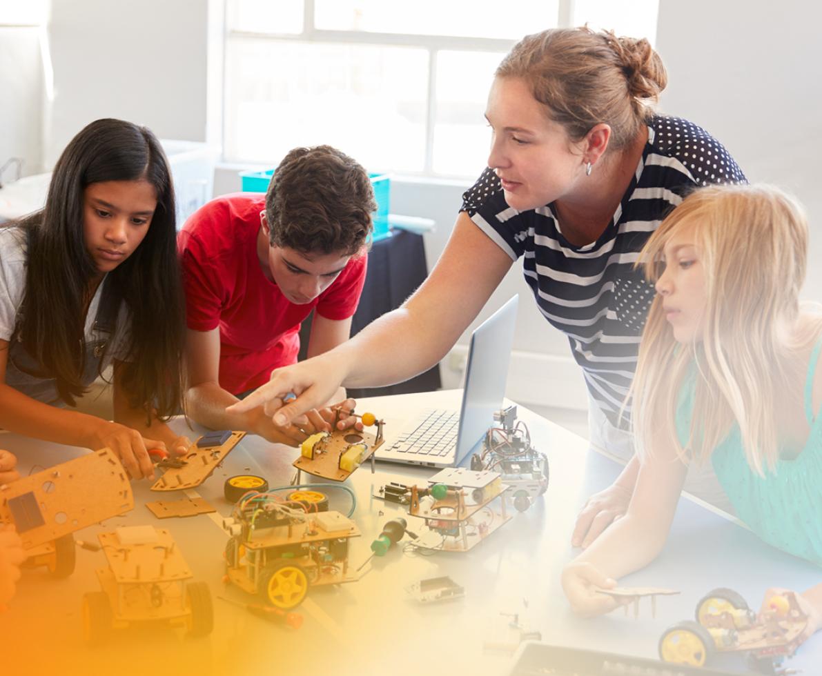 A teacher working with students