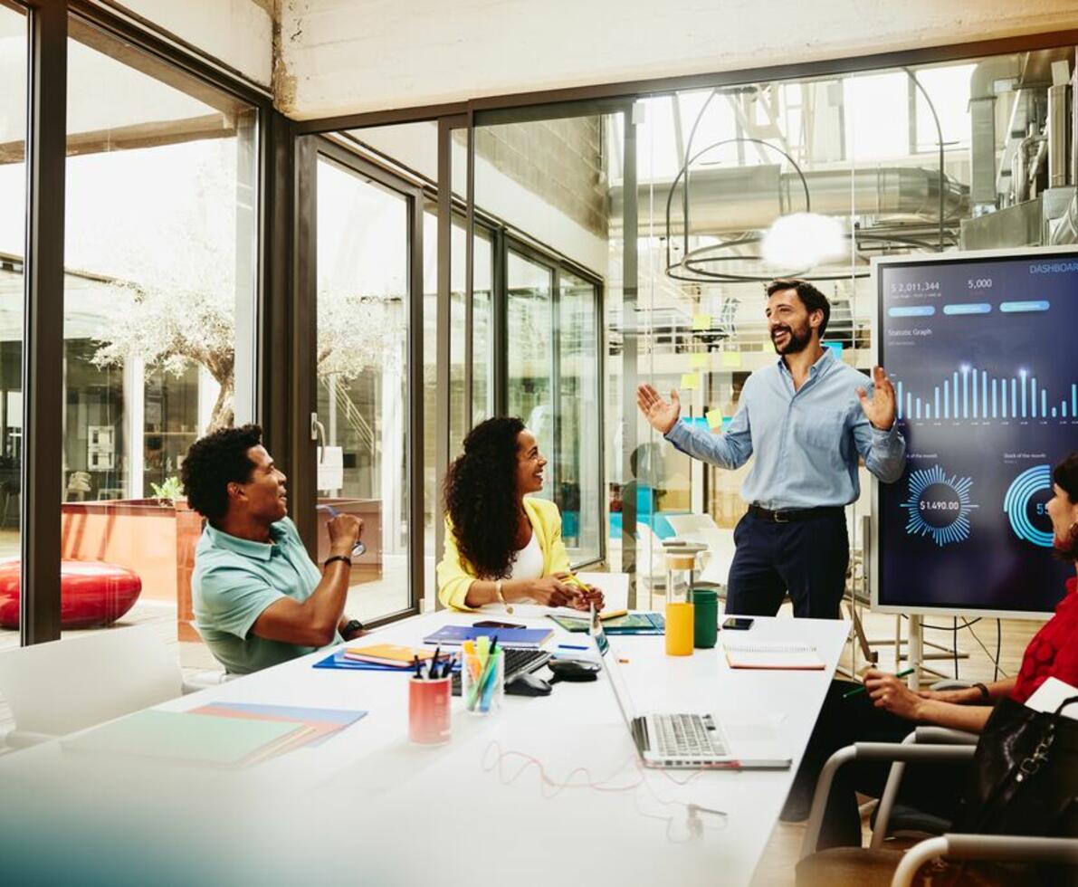 four people in a meeting