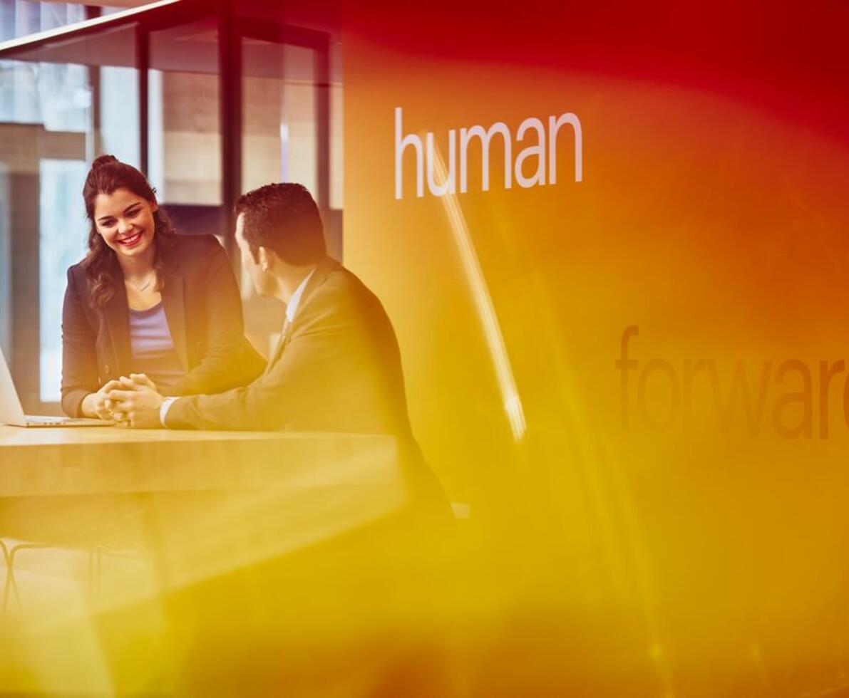 man and woman working together