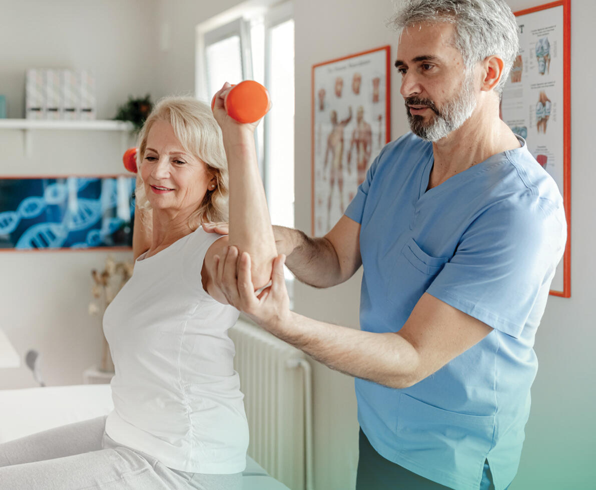 A man helping a woman exercise