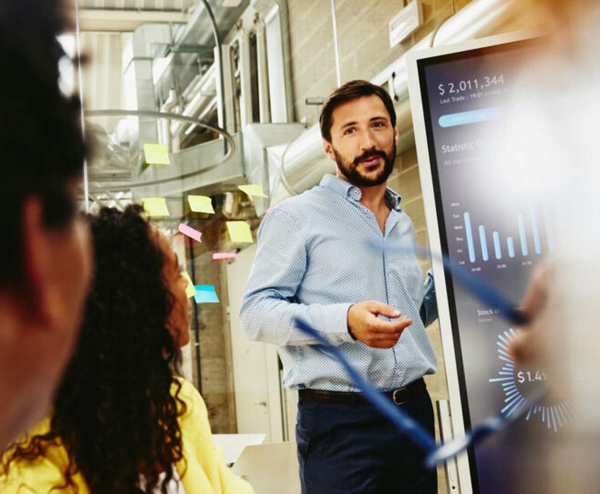 man presenting in a meeting