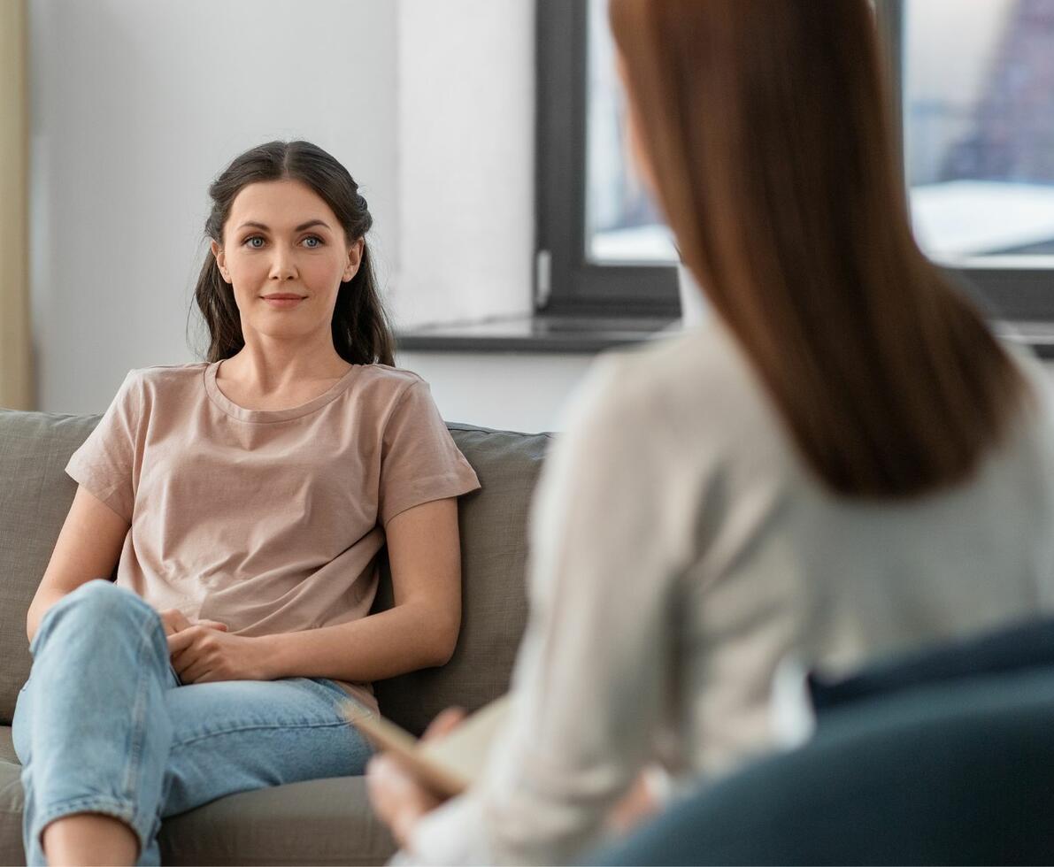 image of a healthcare worker talking with her patient