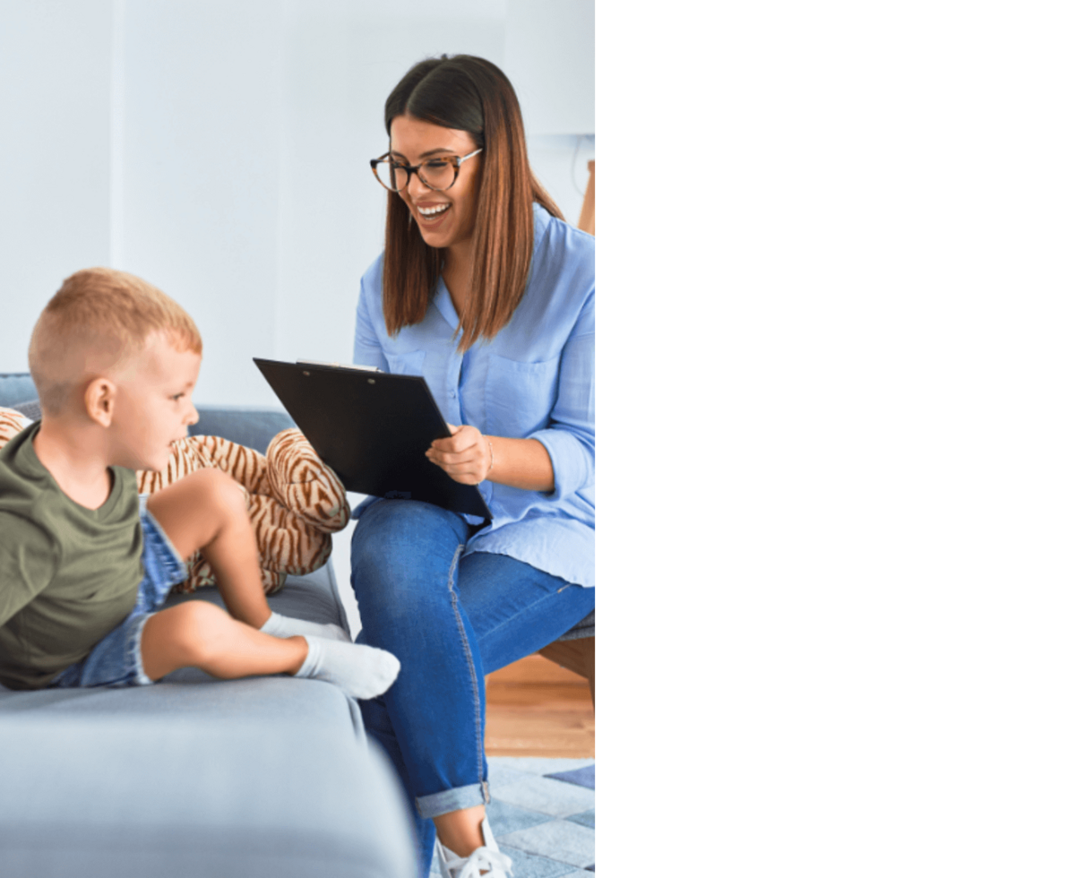 an image of a woman wearing glasses while talking to a child while holding a clipboard