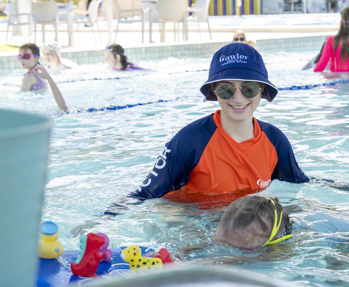 woman swim instructor with cap 