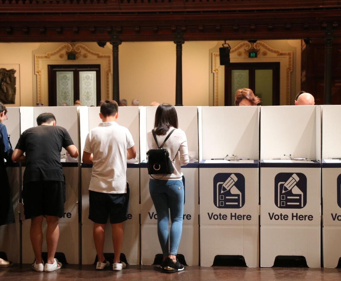 back of people voting