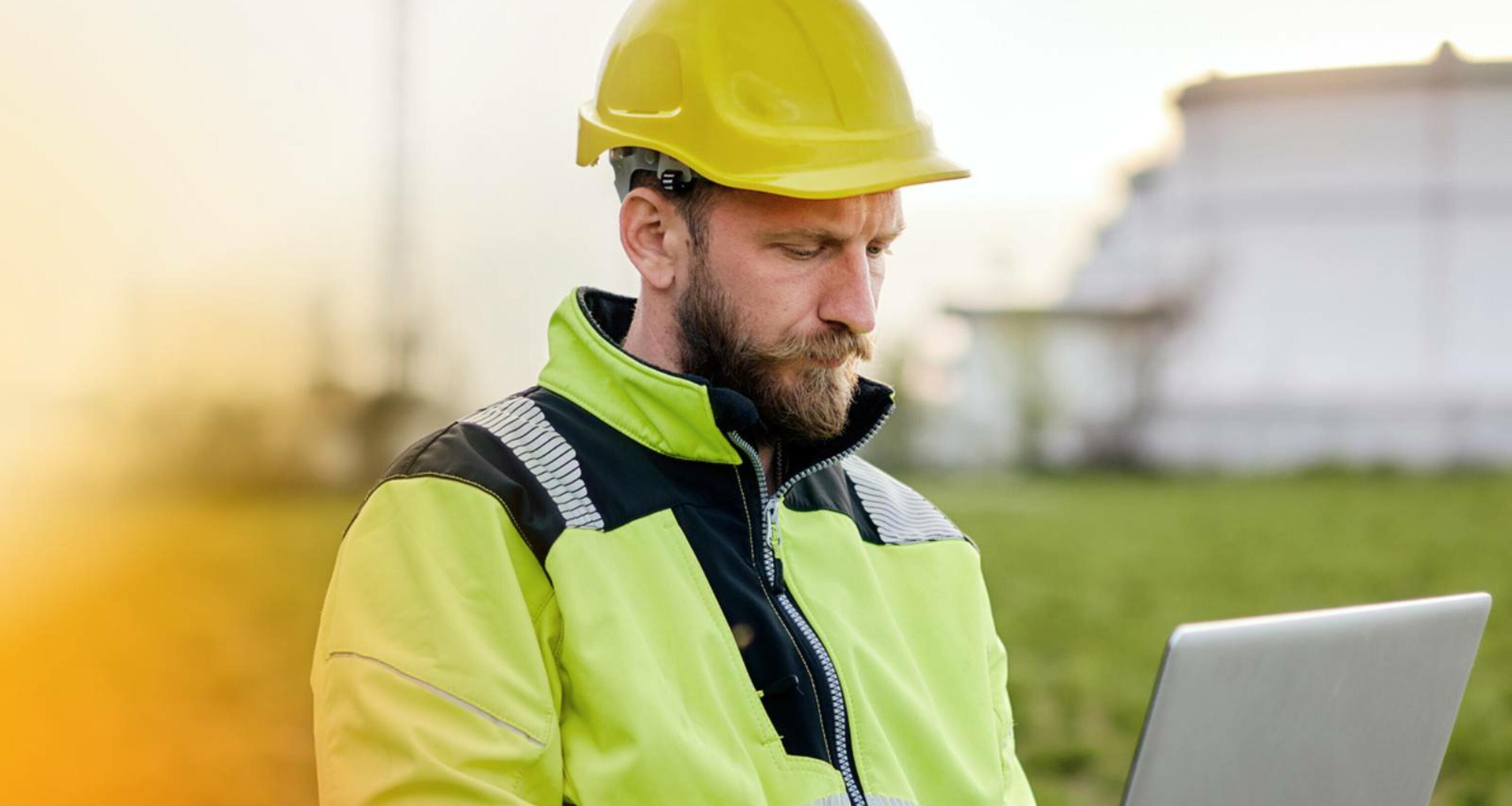 Man working in a hard hat Man working in a hard hat