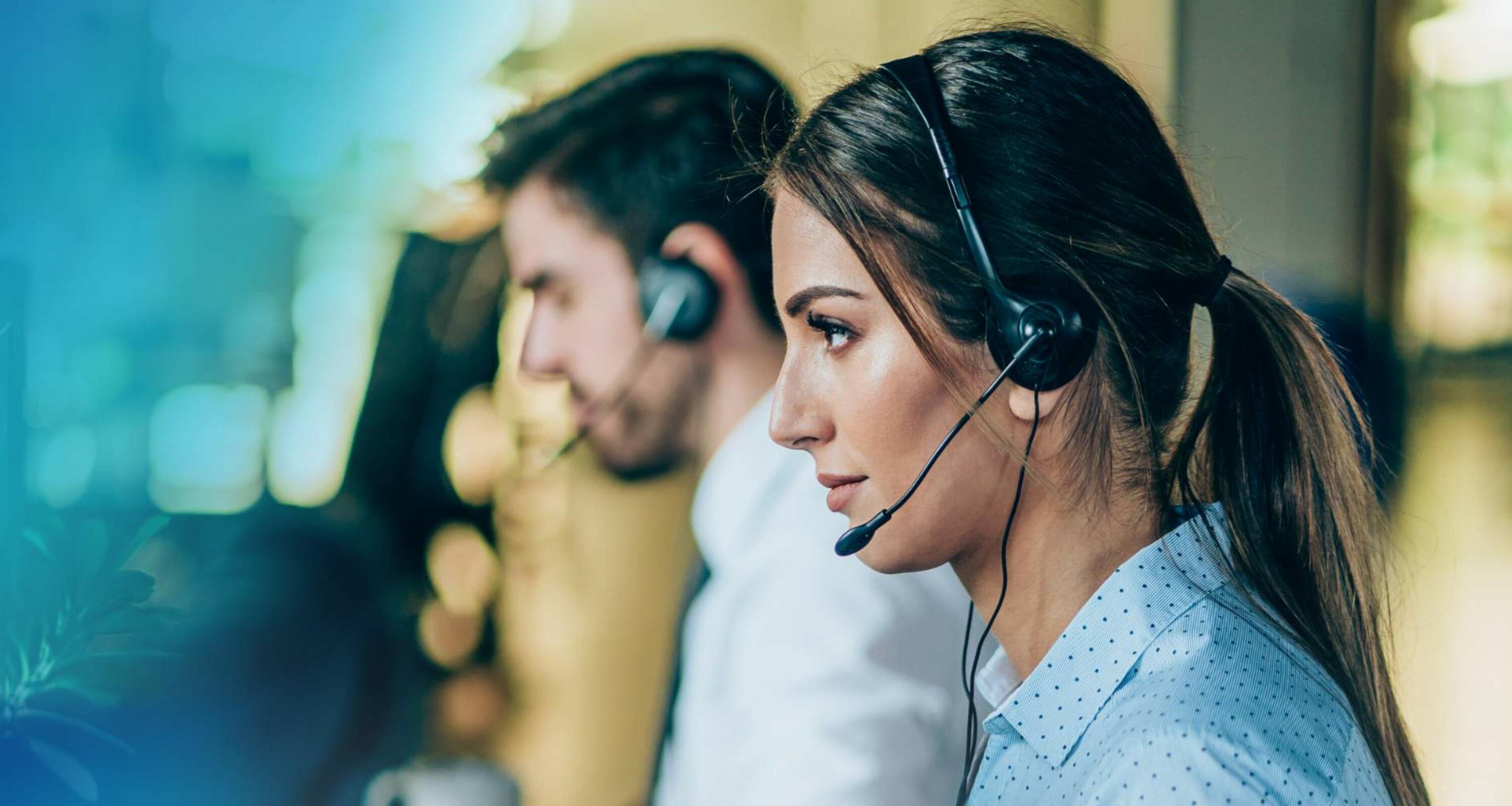 woman and man working in a call centre woman and man working in a call centre