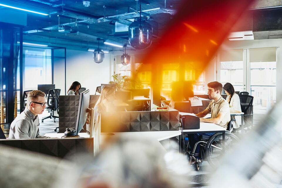 Corporate office with employees seated