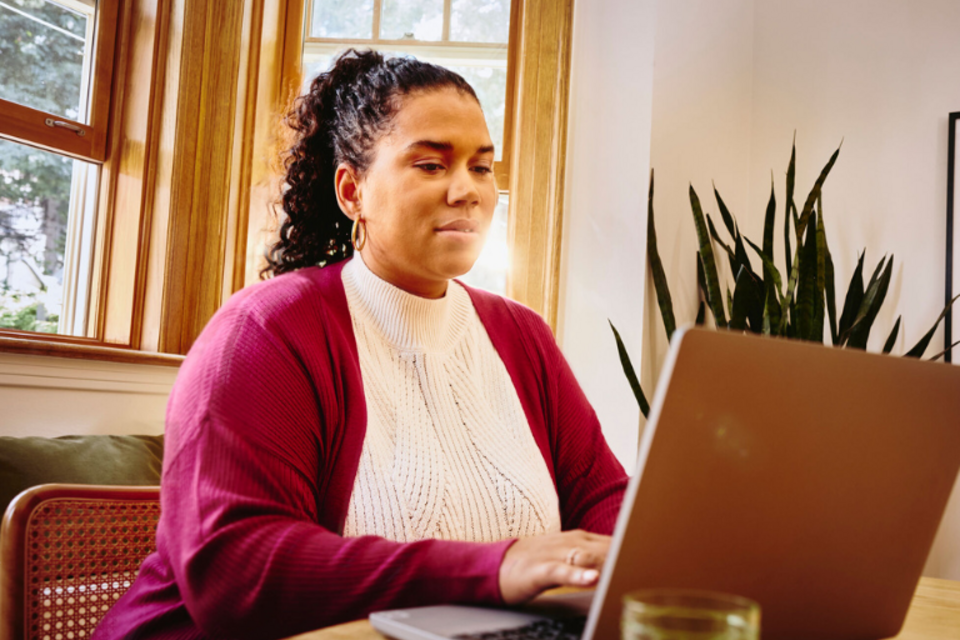 an image of a woman using her laptop 