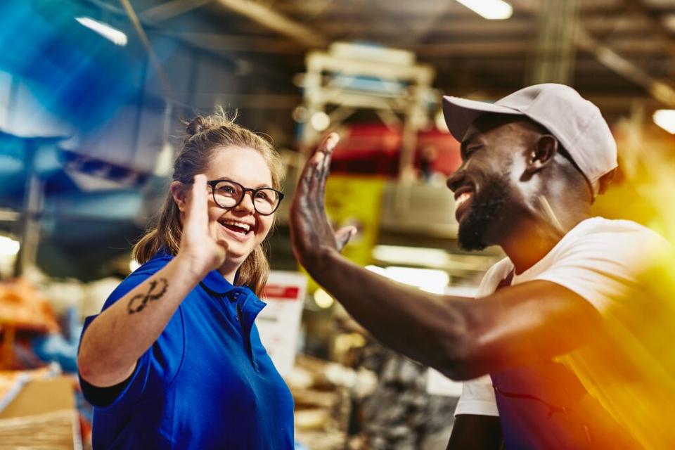 image of girl and man high fiving