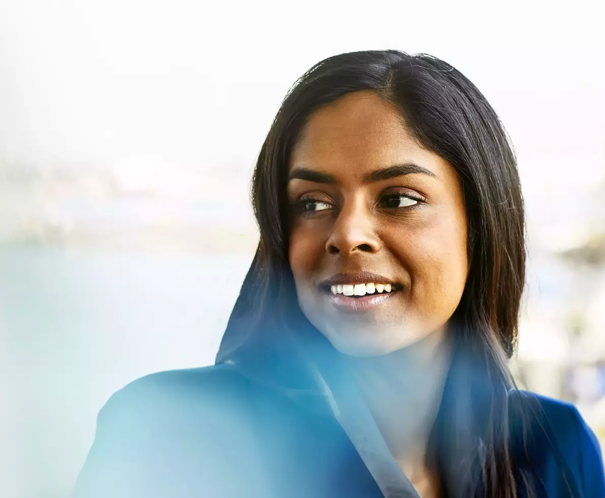Close up - Smiling female looking away 
