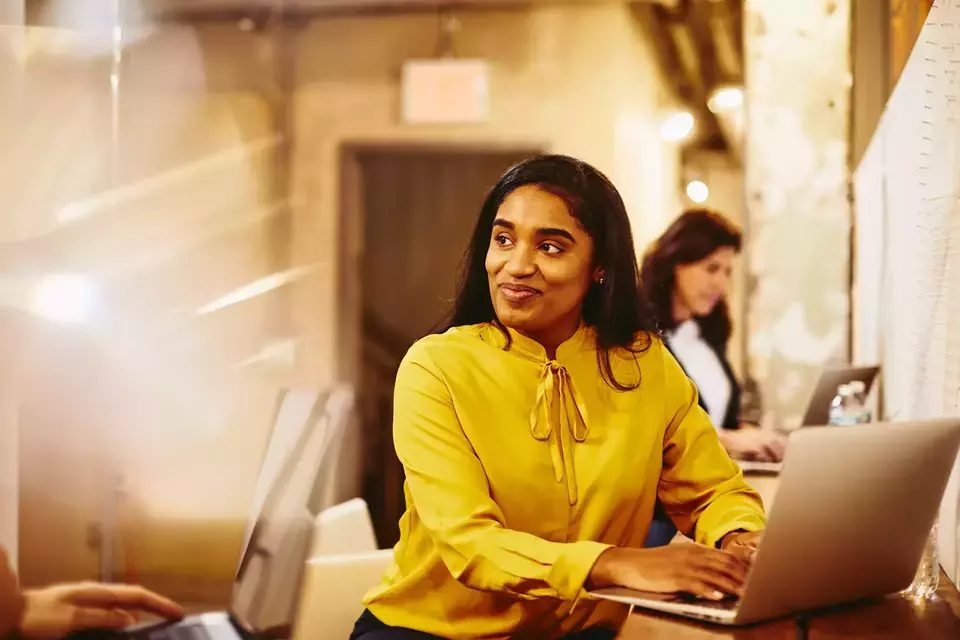 woman in a boardroom at work