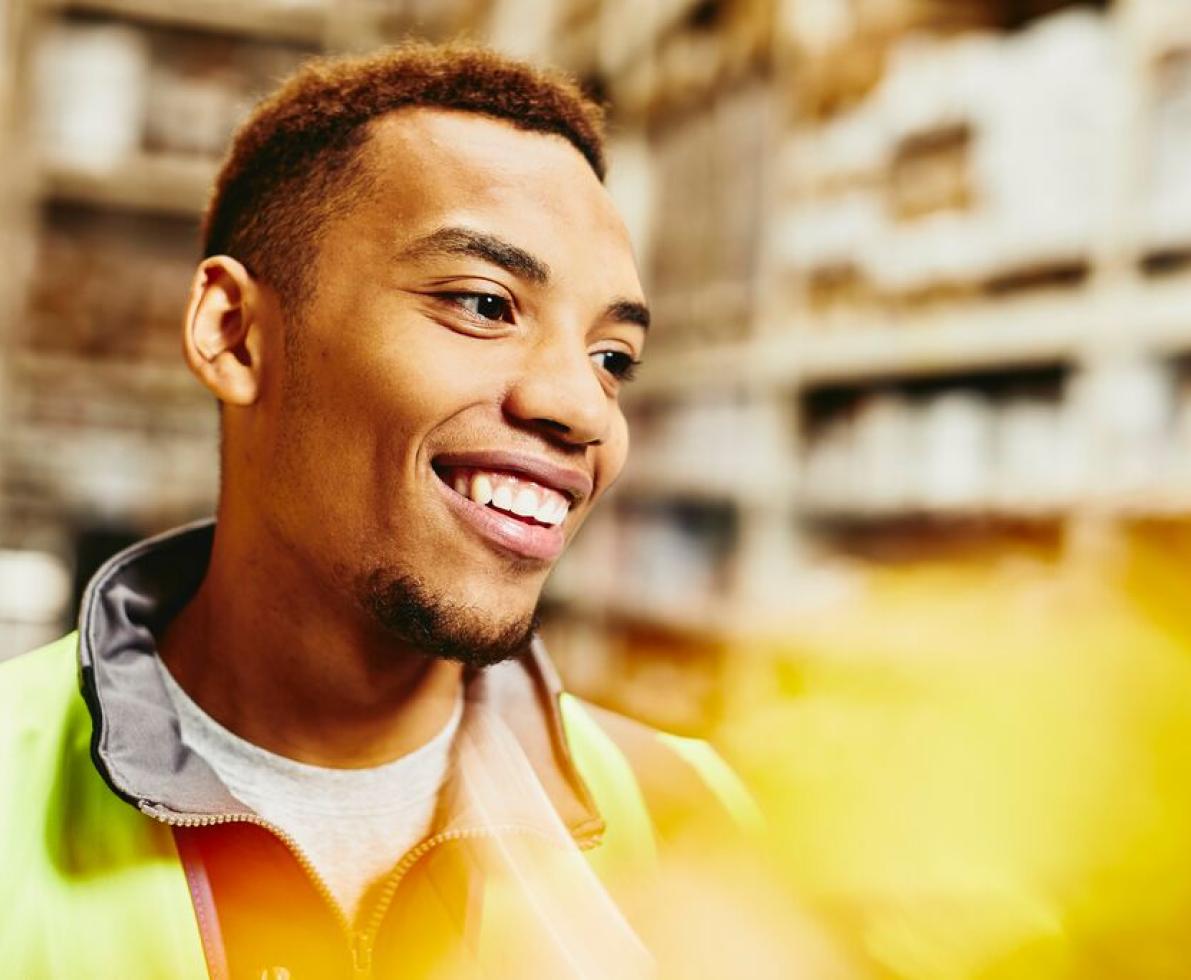 A photo of a man working as a forklift driver A photo of a man working as a forklift driver