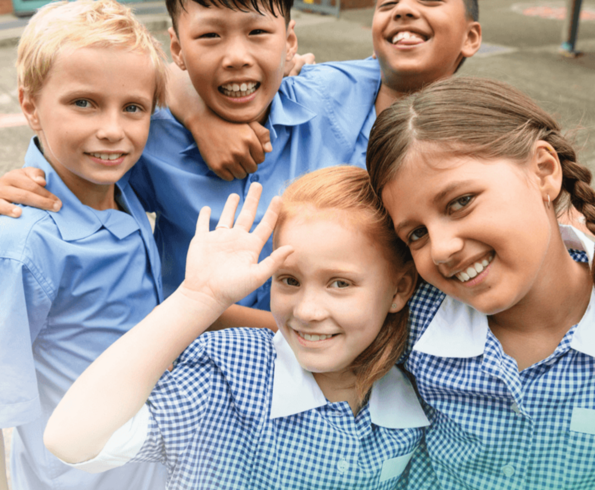 an image of kids smiling and posing for the camera an image of kids smiling and posing for the camera